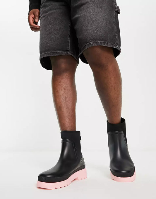 CHELSEA WELLINGTON BOOTS IN BLACK WITH PINK CONTRAST SOLE